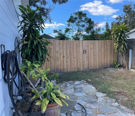 a plant that is in front of house