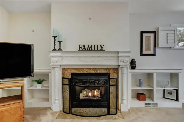 a view of workspace with furniture and a window