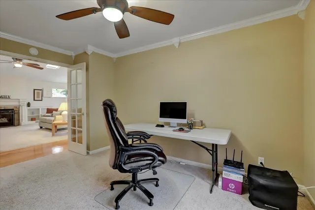 a view of a living room with a wooden floor