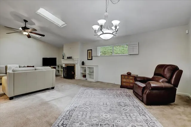 a kitchen with cabinets and wooden floor