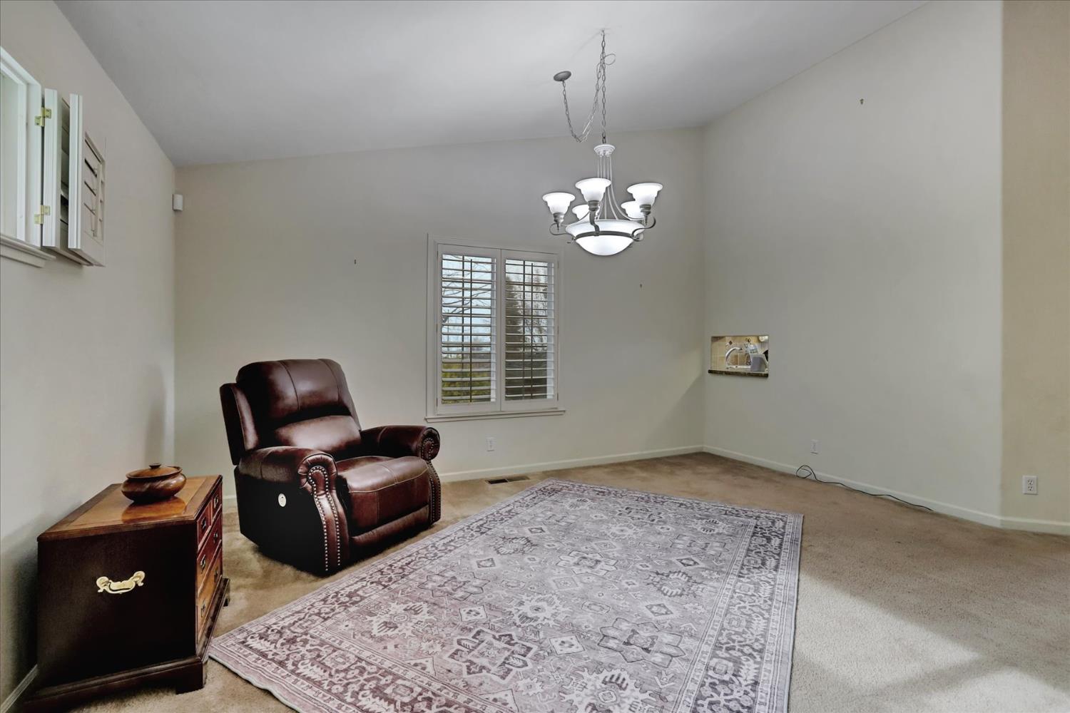 124 Ruby Ledge Court Grass Valley, CA 95945 - Photo 16 of 87 a view of workspace with furniture and a window