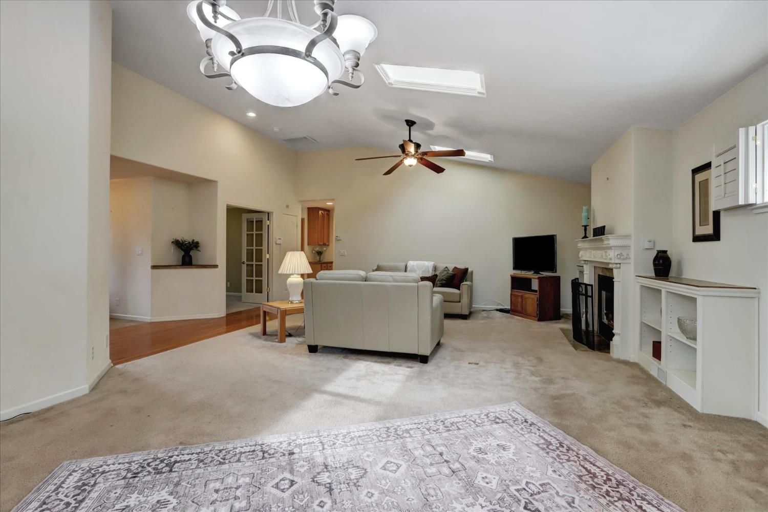 124 Ruby Ledge Court Grass Valley, CA 95945 - Photo 17 of 87 a living room with furniture and a flat screen tv