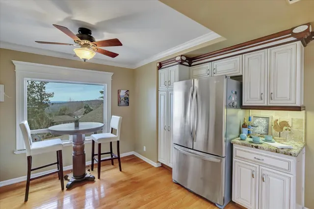 a bathroom with a double vanity sink mirror and toilet