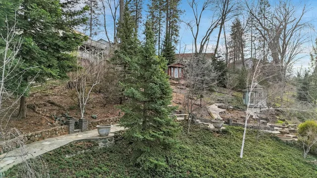 a backyard of a house with lots of green space