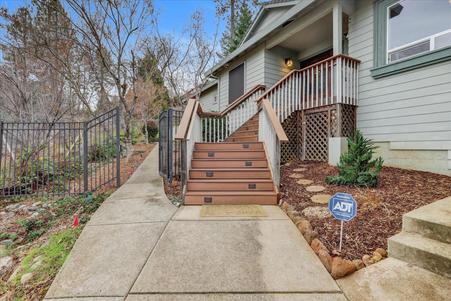 124 Ruby Ledge Court Grass Valley, CA 95945 - Photo 50 of 87 a front view of a house with a yard