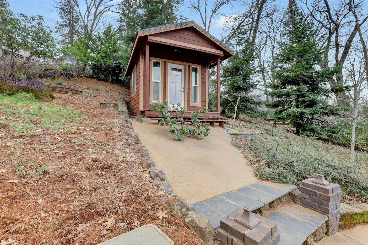 124 Ruby Ledge Court Grass Valley, CA 95945 - Photo 65 of 87 a view of a house with a yard