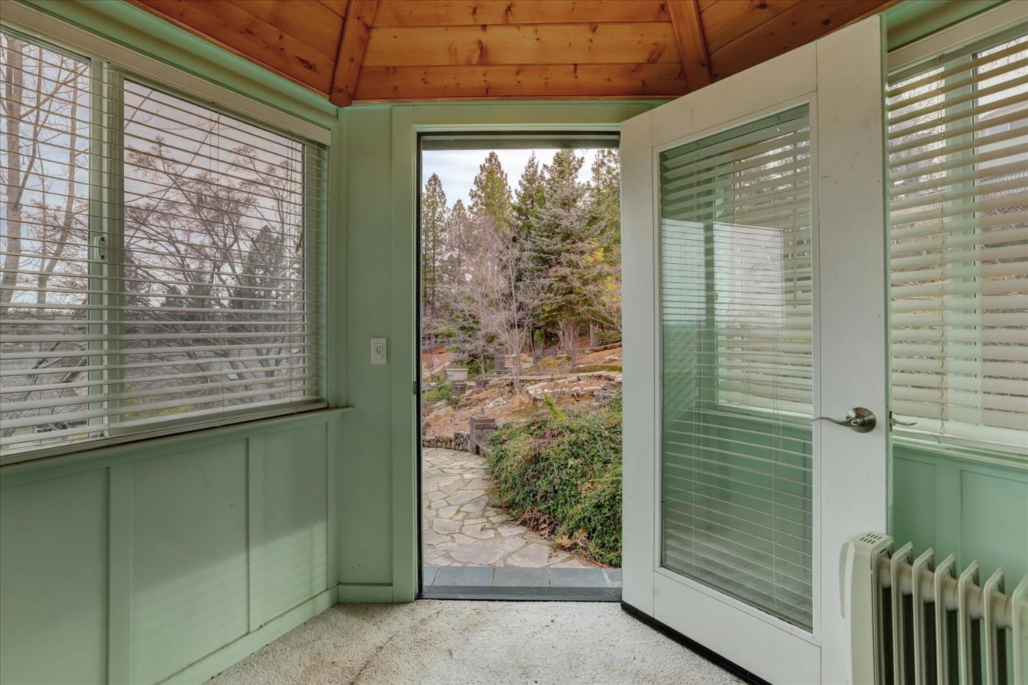124 Ruby Ledge Court Grass Valley, CA 95945 - Photo 71 of 87 a view of a room that has a large window