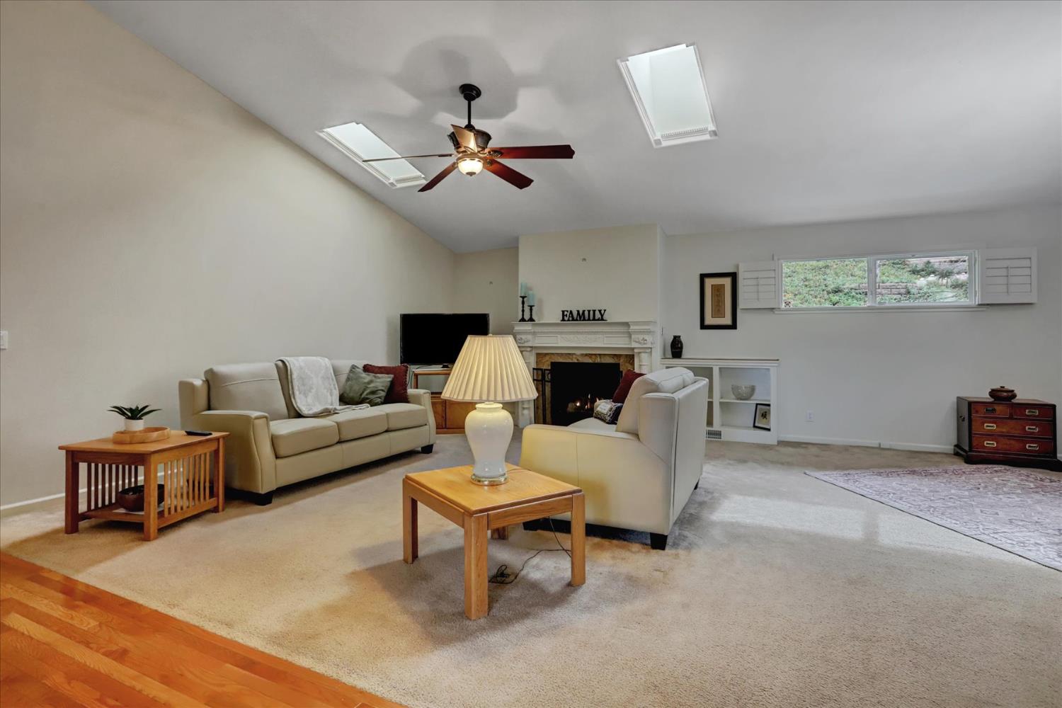 124 Ruby Ledge Court Grass Valley, CA 95945 - Photo 10 of 87 a living room with furniture and a chandelier