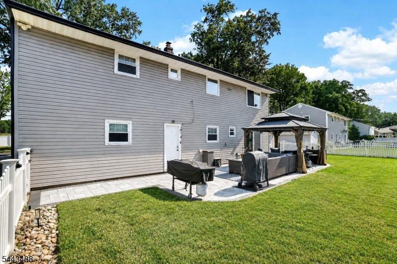 151 East Prospect Street Clark, NJ 07066 - Photo 26 of 31 a view of a house with backyard and sitting area