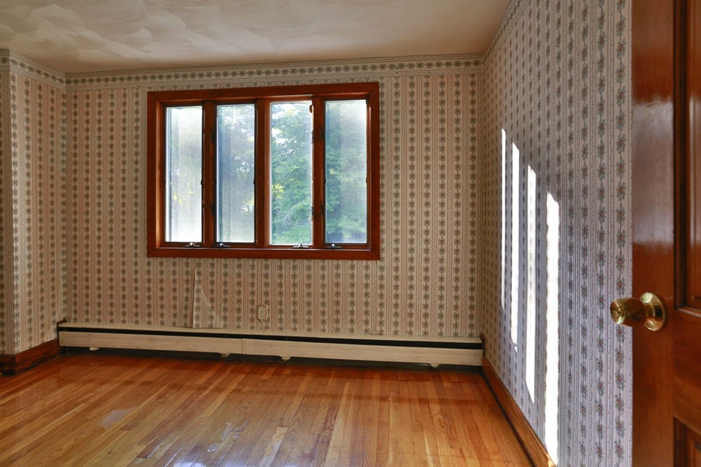 485 Rhodes Avenue Woonsocket, RI 02895 - Photo 11 of 18 a view of a room with wooden floor and a window