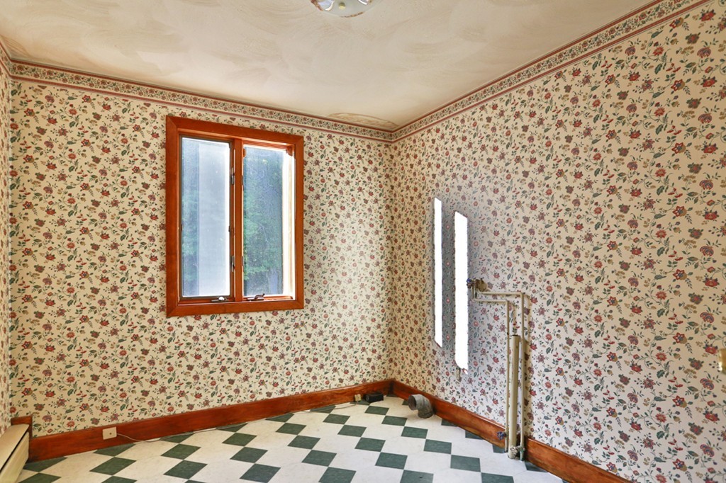 485 Rhodes Avenue Woonsocket, RI 02895 - Photo 13 of 18 a bathroom with a sink and a shower