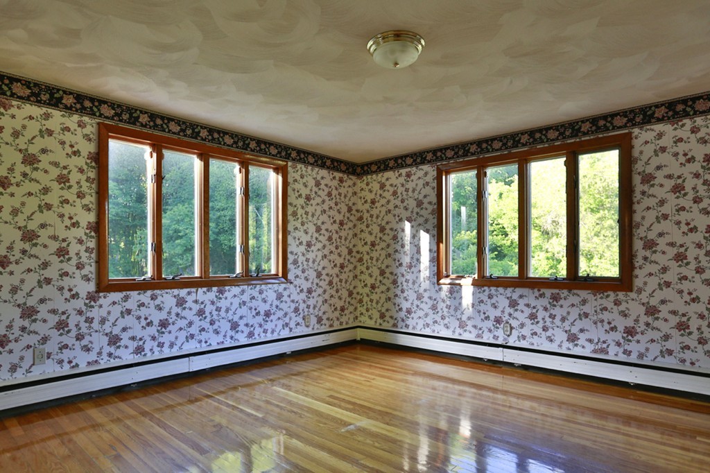 485 Rhodes Avenue Woonsocket, RI 02895 - Photo 10 of 18 a view of lot of window and carpet in wooden floor