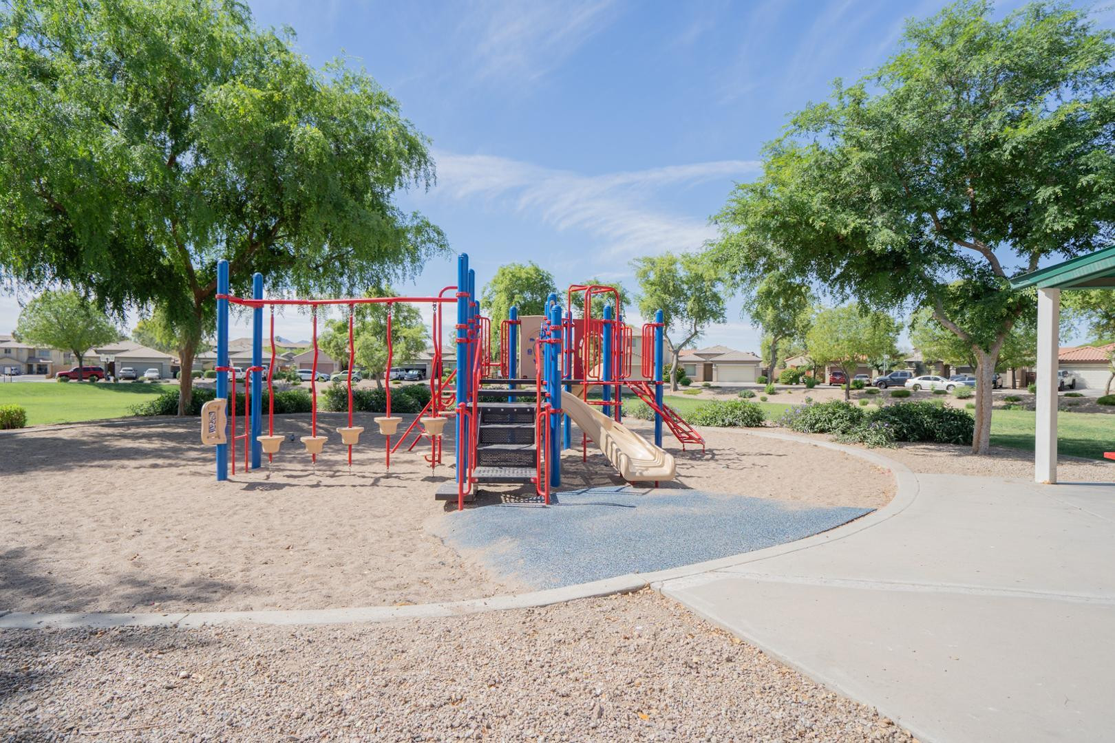 9377 West Milkweed Loop Phoenix, AZ 85037 - Photo 27 of 28 a view of a park with slide