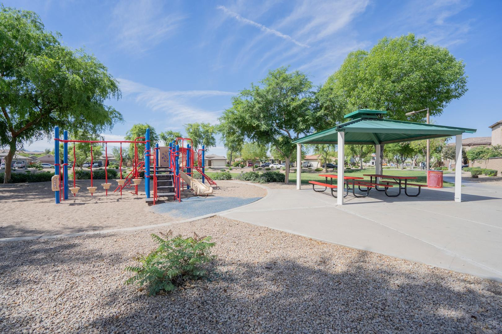9377 West Milkweed Loop Phoenix, AZ 85037 - Photo 28 of 28 a view of park with large trees