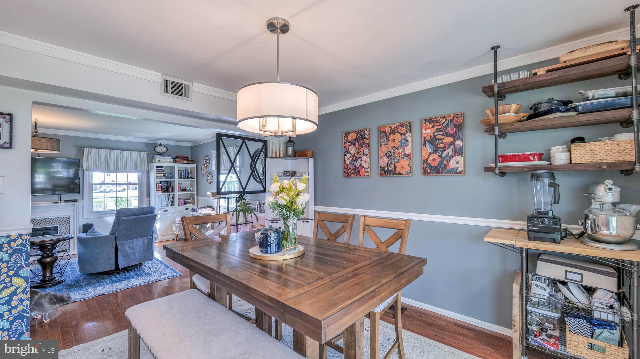 1 Chadwick Avenue Marlton, NJ 08053 - Photo 13 of 41 a view of a dining room with furniture a chandelier and wooden floor