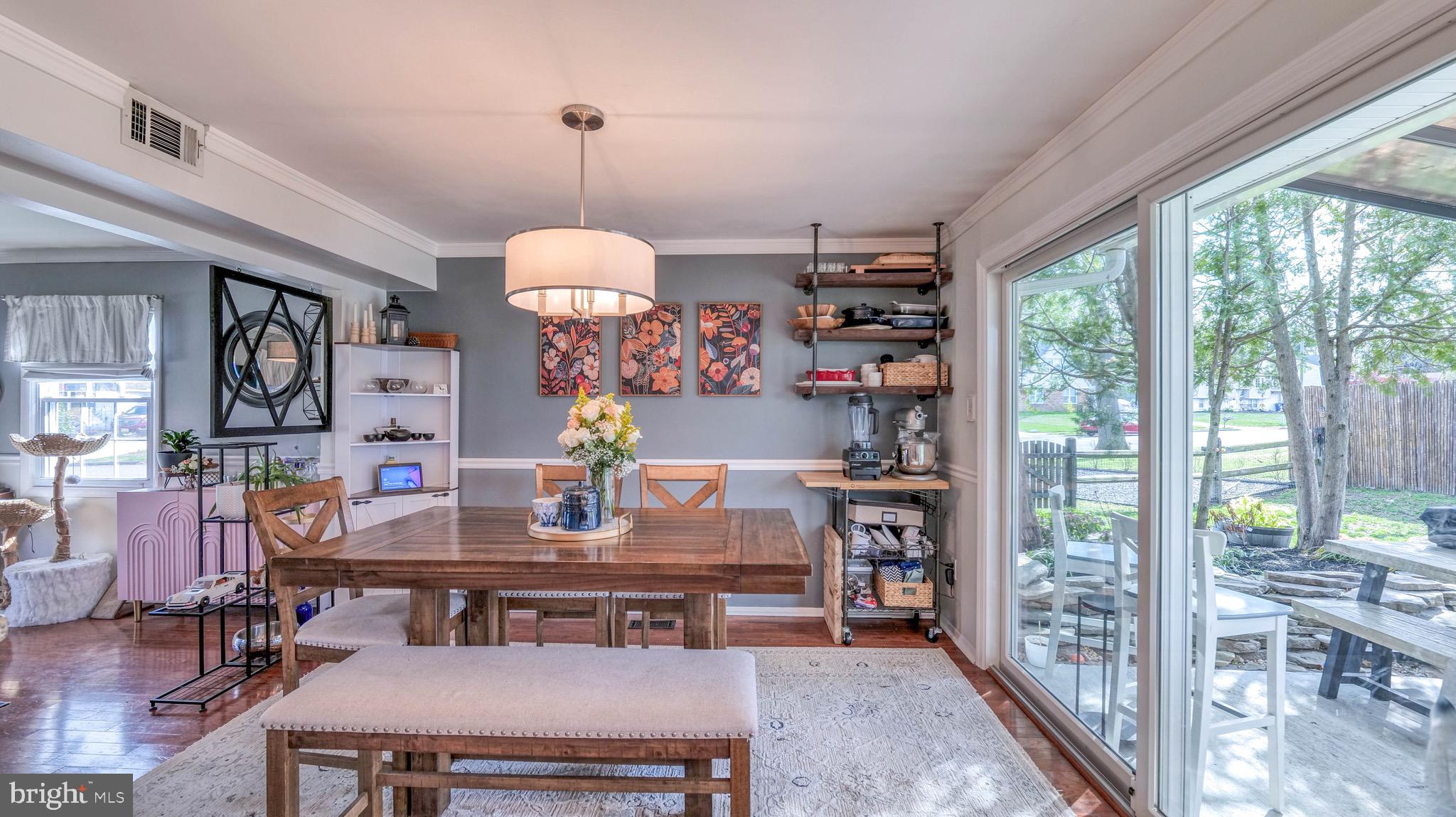 1 Chadwick Avenue Marlton, NJ 08053 - Photo 14 of 41 a view of a dining room with furniture large windows and wooden floor