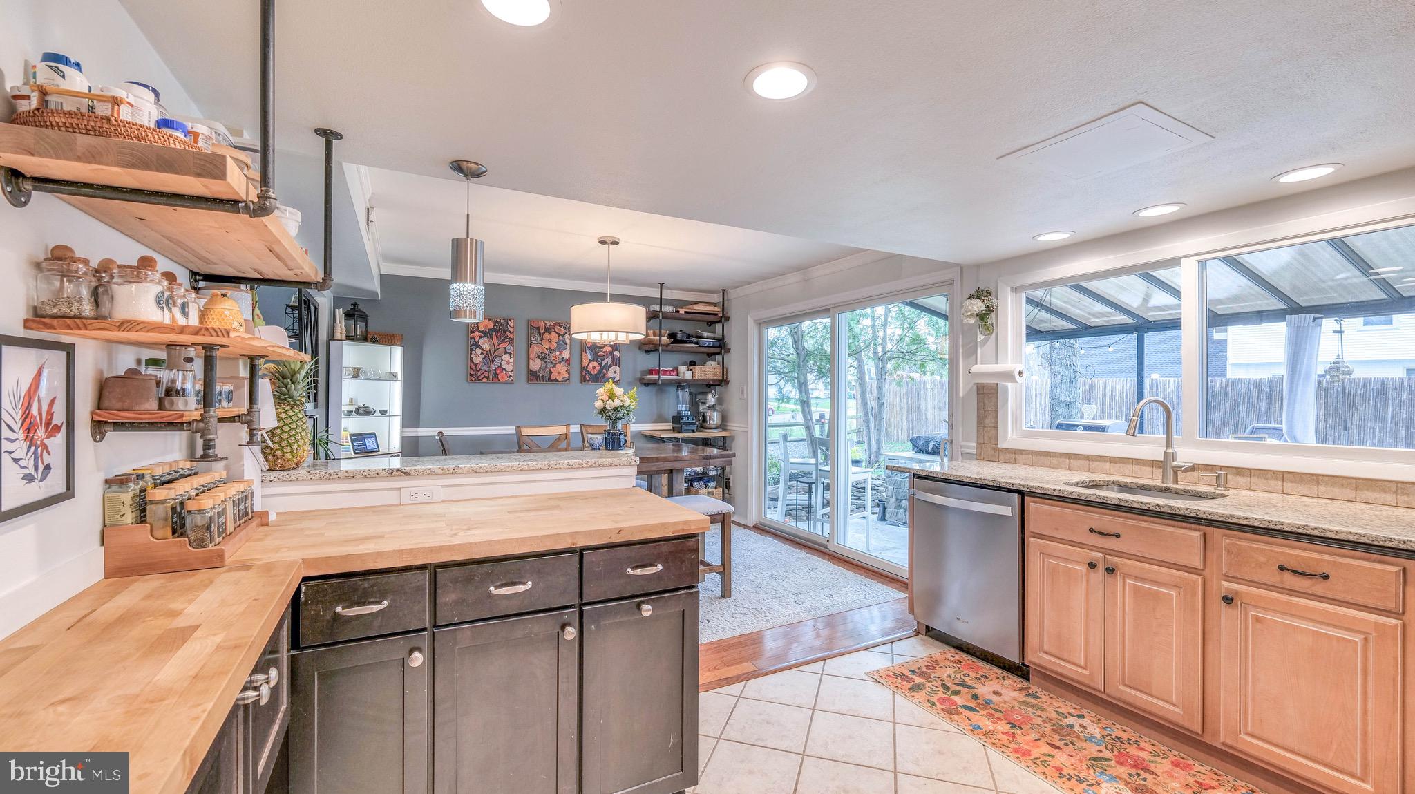 1 Chadwick Avenue Marlton, NJ 08053 - Photo 17 of 41 a kitchen with stainless steel appliances granite countertop a sink and cabinets