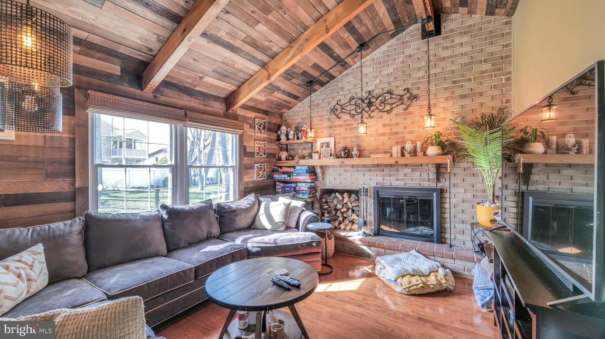 1 Chadwick Avenue Marlton, NJ 08053 - Photo 22 of 41 a living room with furniture and a fireplace