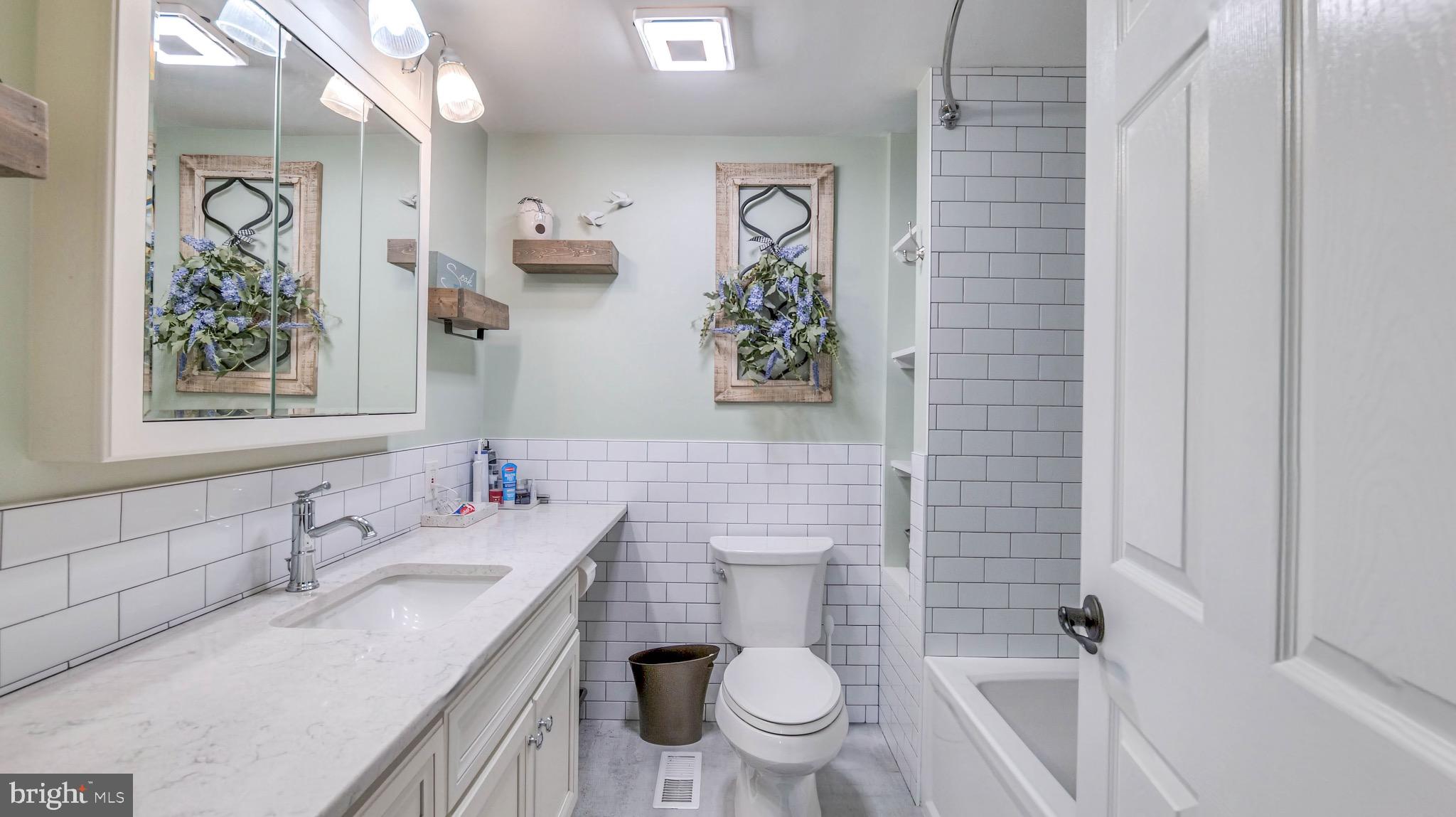 1 Chadwick Avenue Marlton, NJ 08053 - Photo 25 of 41 a bathroom with a granite countertop sink toilet and shower