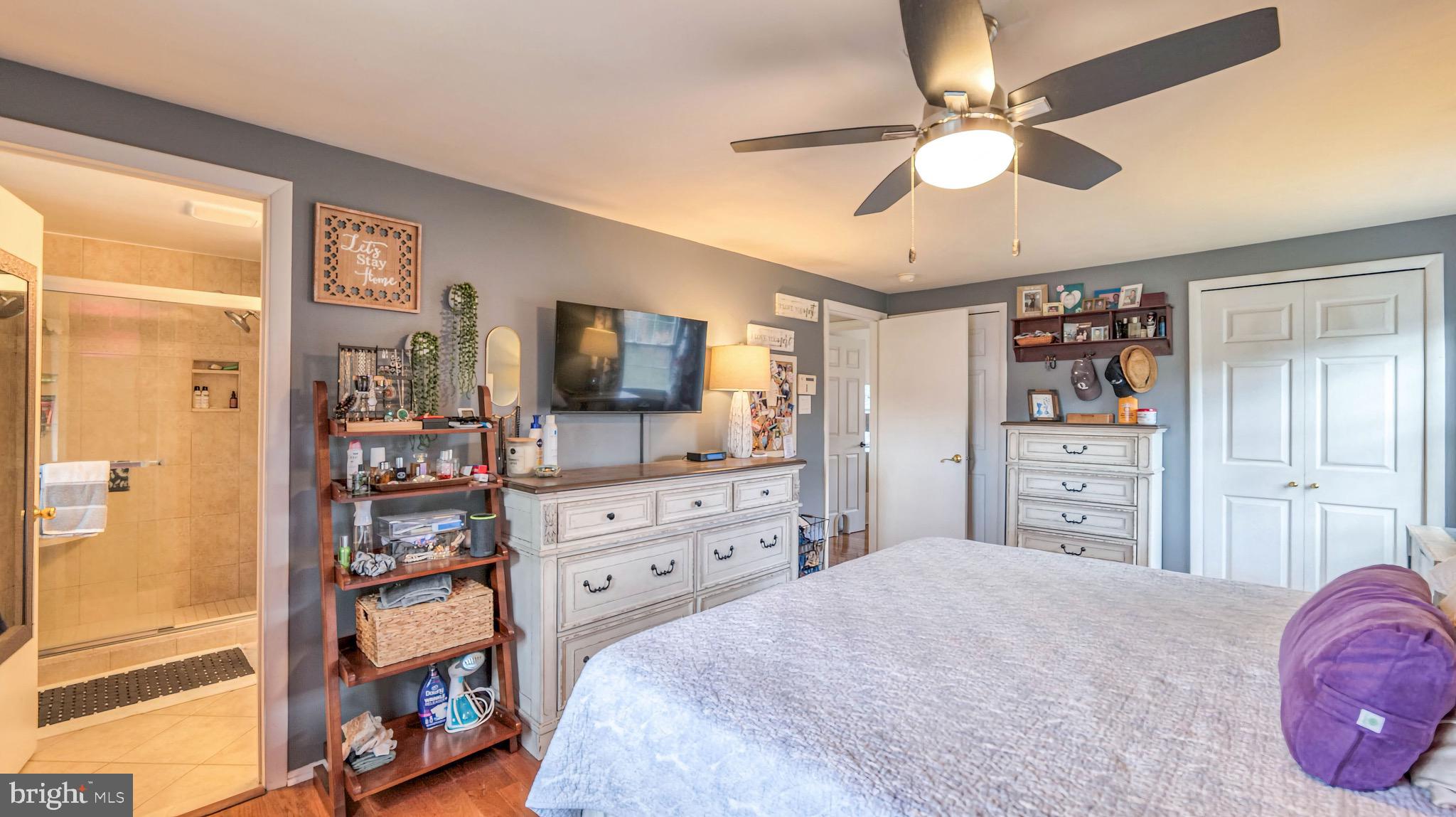 1 Chadwick Avenue Marlton, NJ 08053 - Photo 30 of 41 a bedroom with a bed dresser and flat tv screen