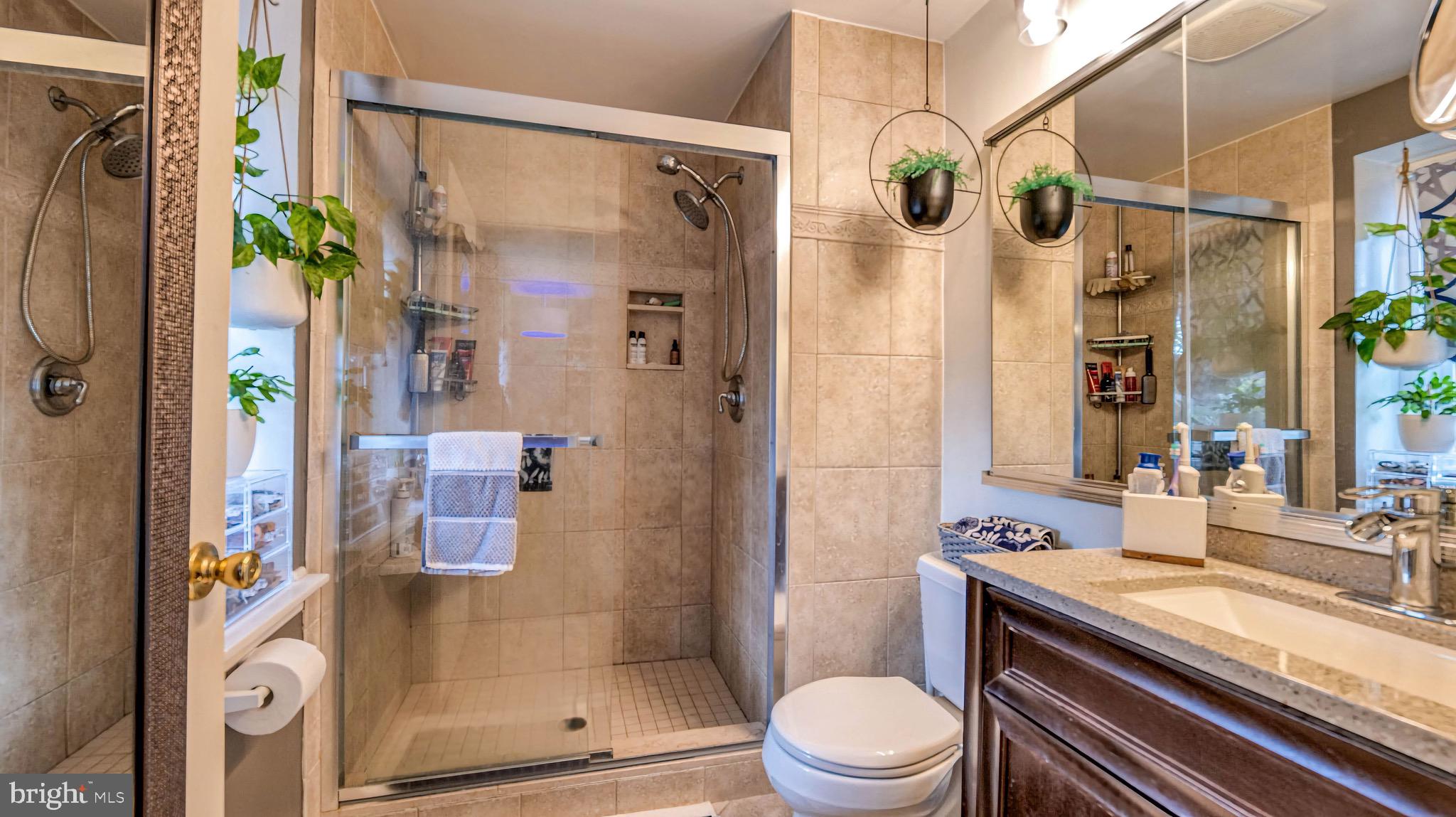 1 Chadwick Avenue Marlton, NJ 08053 - Photo 31 of 41 a bathroom with a granite countertop shower a sink and toilet