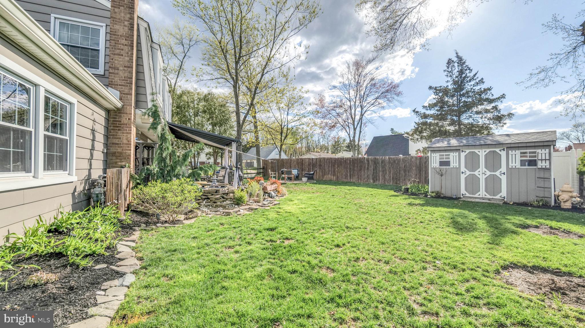 1 Chadwick Avenue Marlton, NJ 08053 - Photo 41 of 41 a view of a backyard with plants and large trees