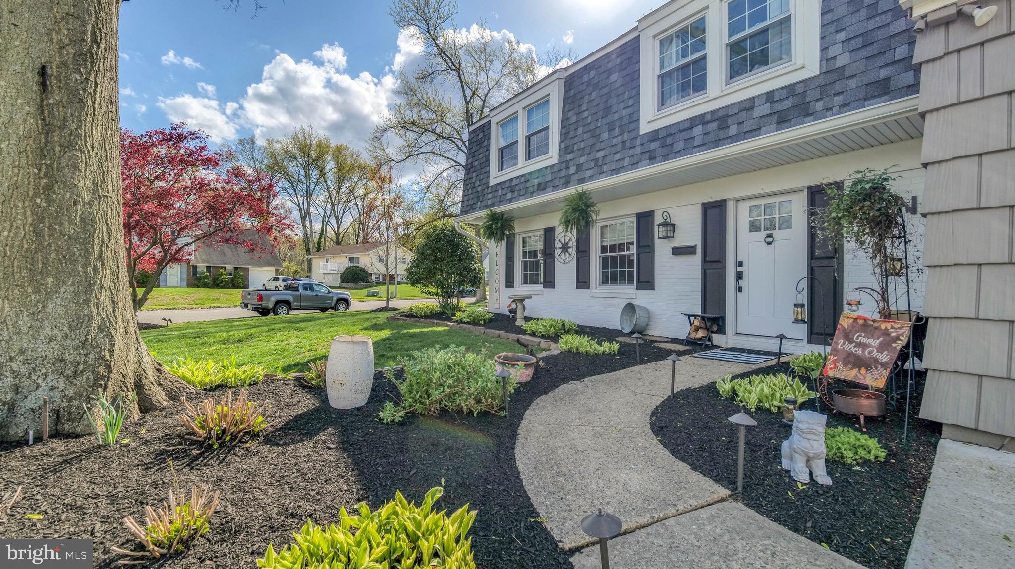 1 Chadwick Avenue Marlton, NJ 08053 - Photo 6 of 41 a front view of a house with garden and sitting area