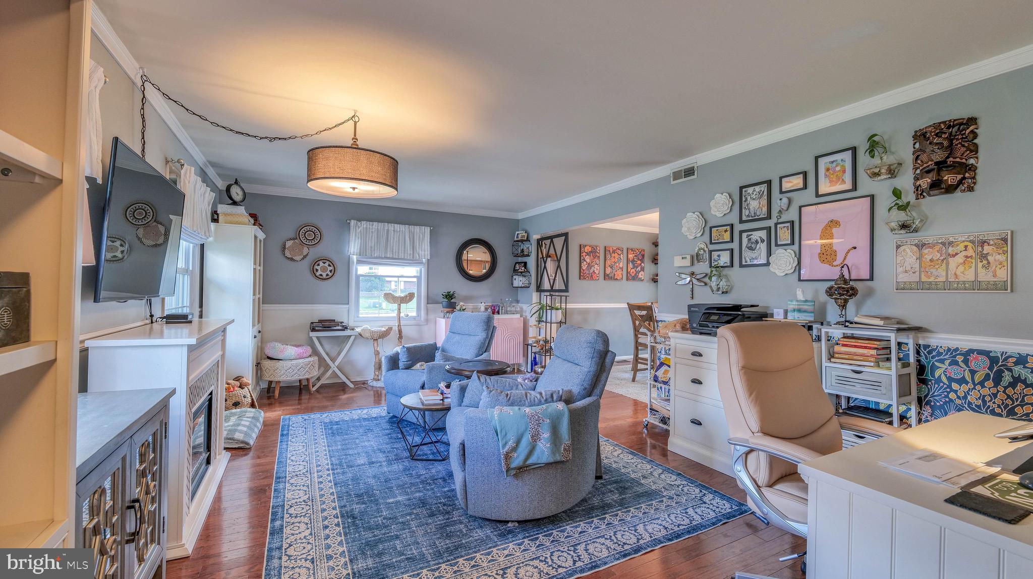 1 Chadwick Avenue Marlton, NJ 08053 - Photo 8 of 41 a living room with furniture and a fireplace