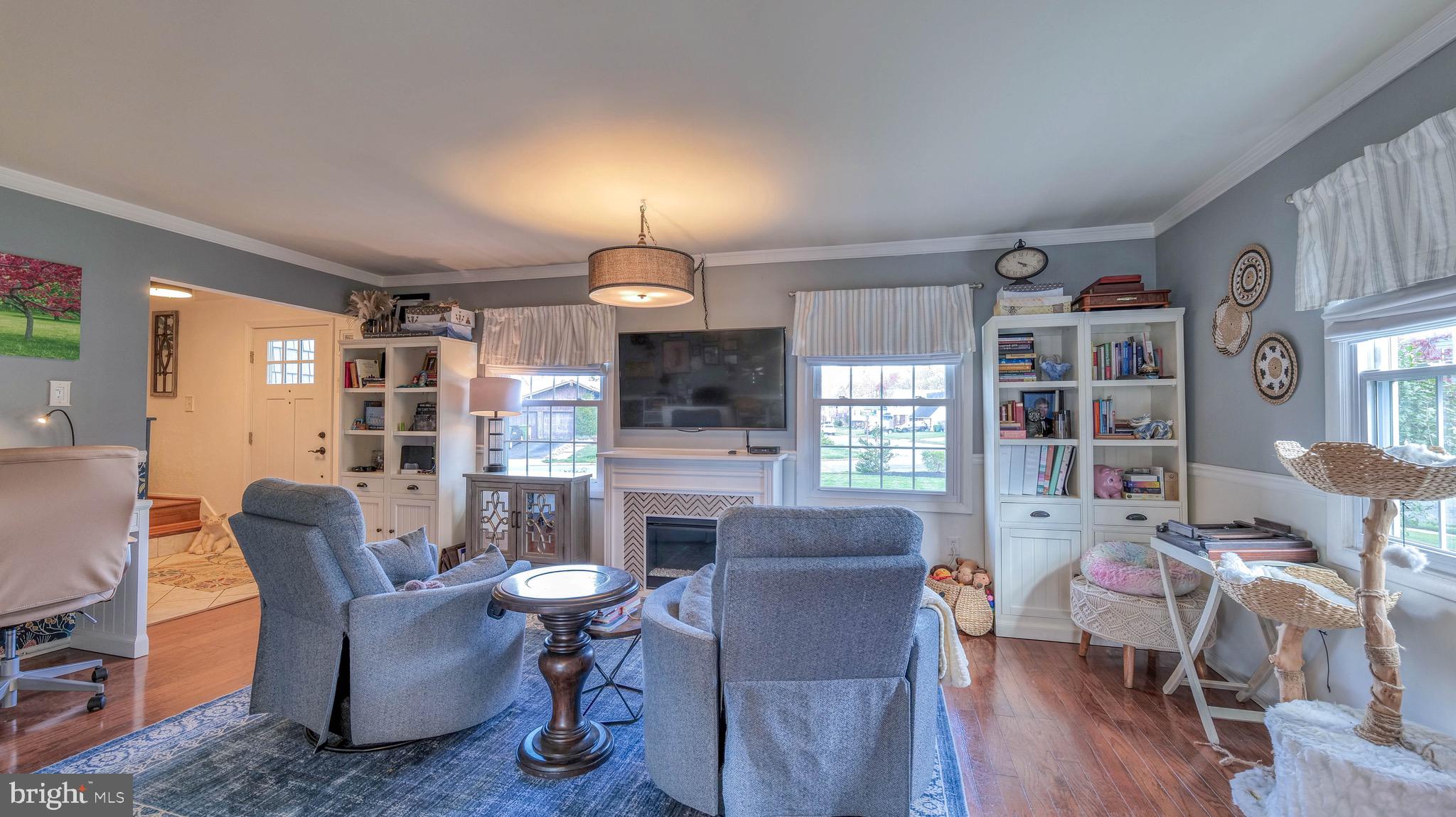 1 Chadwick Avenue Marlton, NJ 08053 - Photo 10 of 41 a living room with furniture dining table and a fireplace