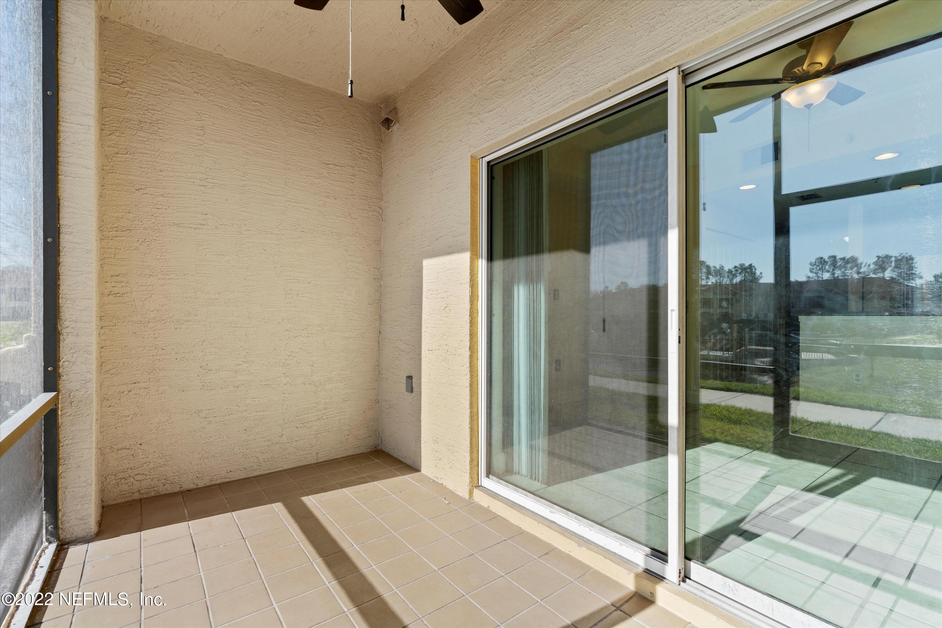 9745 Touchton Road, Unit 3203 Jacksonville, FL 32246 - Photo 21 of 30 a bathroom with a glass shower door