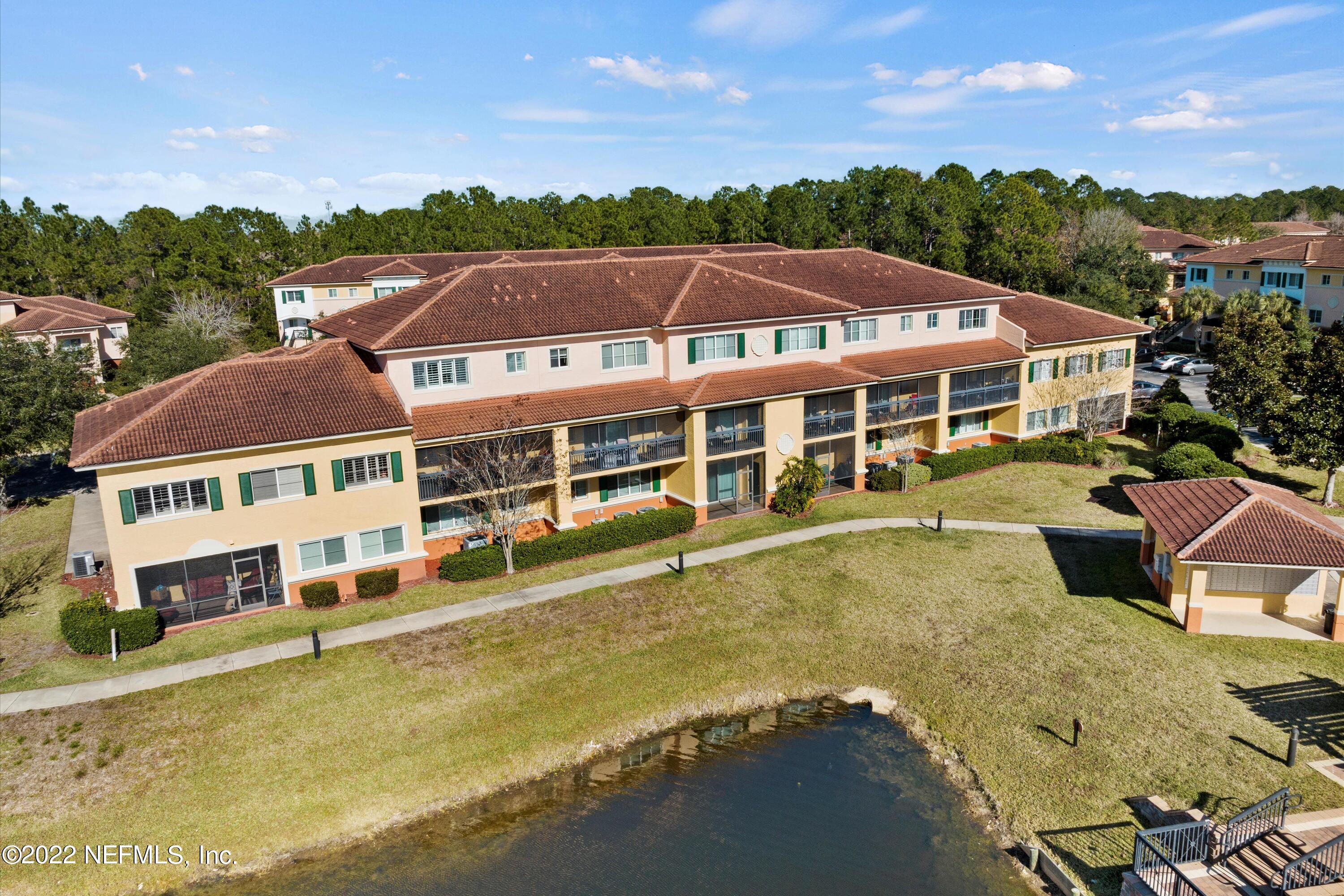 9745 Touchton Road, Unit 3203 Jacksonville, FL 32246 - Photo 23 of 30 a view of a house with a swimming pool