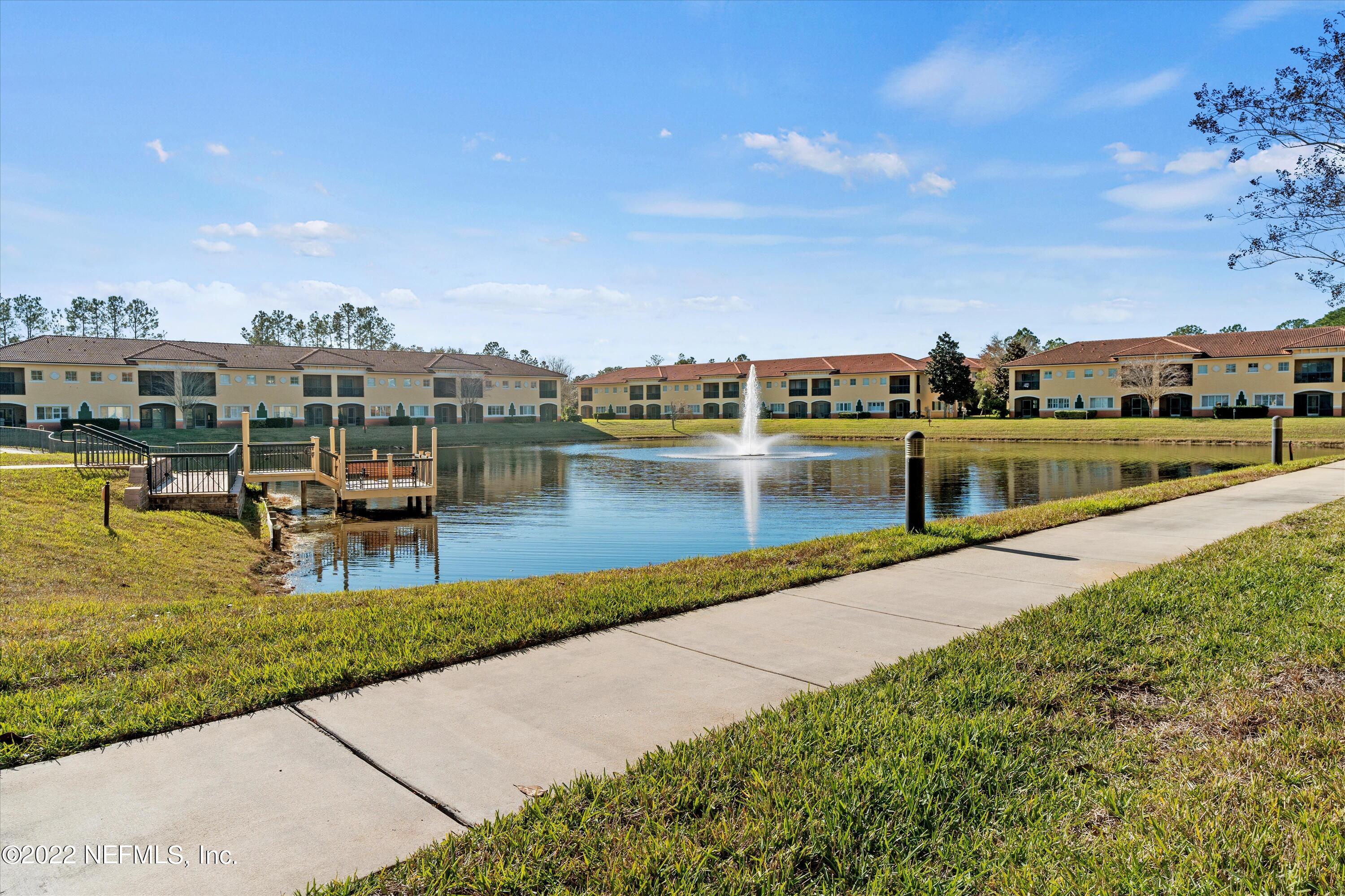 9745 Touchton Road, Unit 3203 Jacksonville, FL 32246 - Photo 25 of 30 a view of a lake with houses