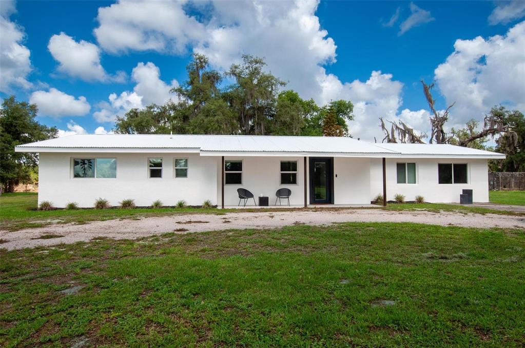 front view of a house with a patio