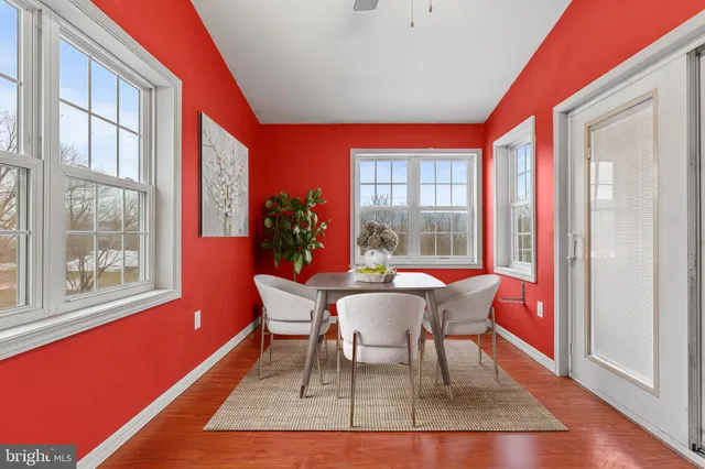front view of a house with a potted plant