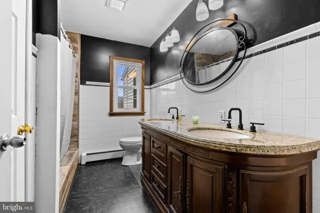a view of a kitchen with a stove and a refrigerator