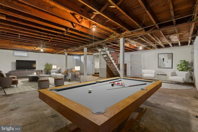a bathroom with a toilet and a bathtub