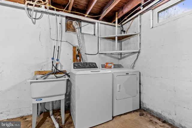 a balcony with wooden floor and furniture