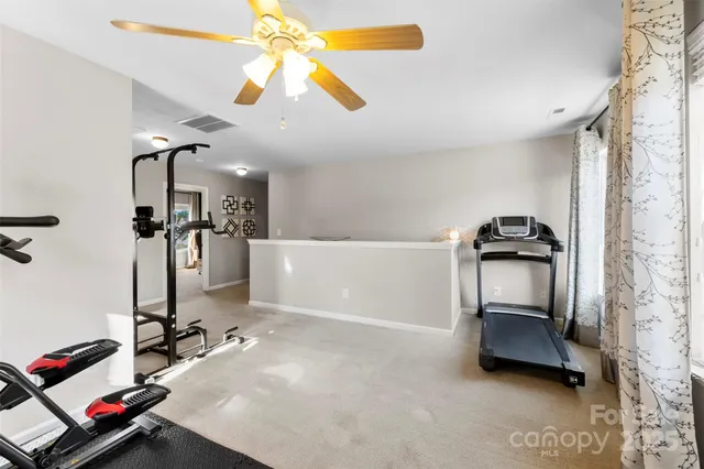 a workspace with furniture and wooden floor