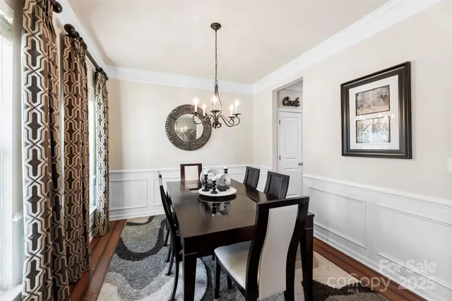 a view of a dining room with furniture and front view