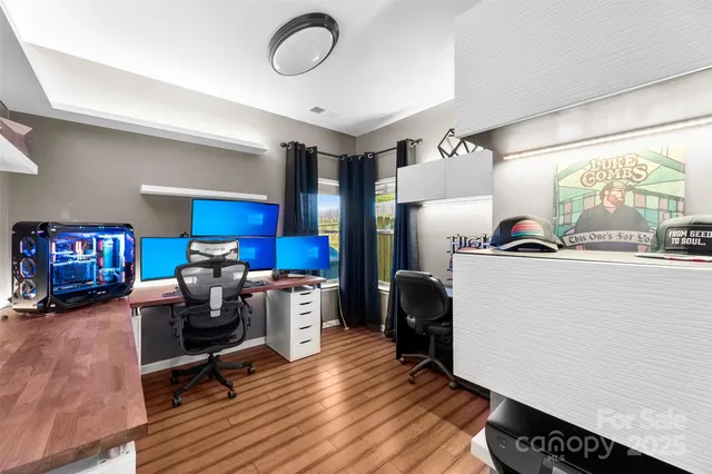 a bathroom with a toilet a sink and a window