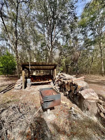 a front view of a house with a wooden fence