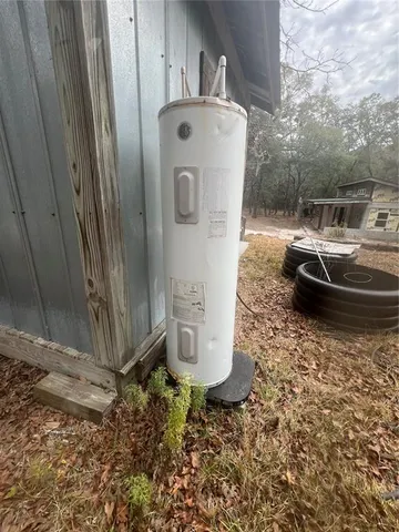a view of a yard with trees