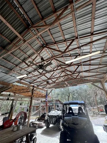 a view of parking garage with cars