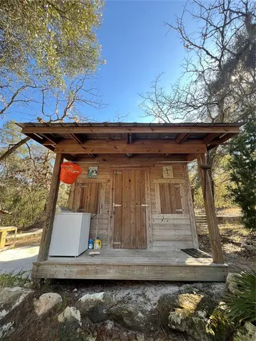 a view of house with wooden floor