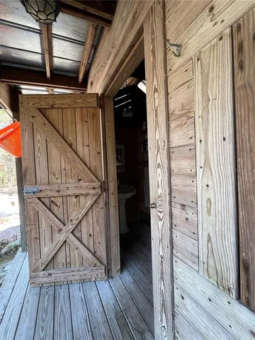a view of entryway with wooden floor