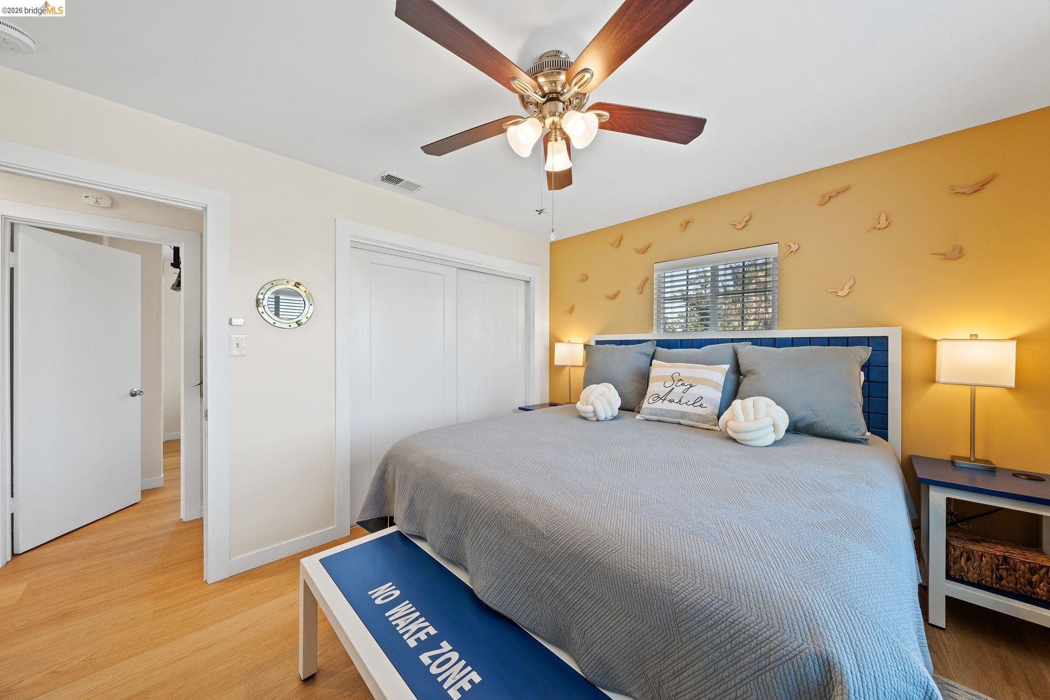 1704 Taylor Road Bethel Island, CA 94511 - Photo 35 of 73 Light wood-finish flooring with a ceiling fan featuring wood-tone blades