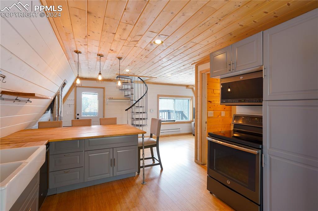 48 Angel Road Rye, CO 81069 - Photo 6 of 25 a kitchen view with wooden floor and cabinets
