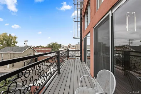 a kitchen with a sink a stove and refrigerator