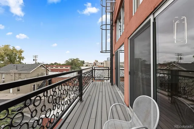 a kitchen with a sink a stove and refrigerator