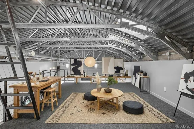 a view of a room with wooden furniture